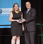 Samantha Lindgren of Sun Buckets accepts the 2016 Navigator Award from Ira Berman of Gulfstream®.